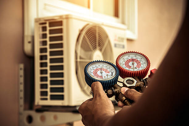 Professional Air Conditioning Service technician working in Baker, FL